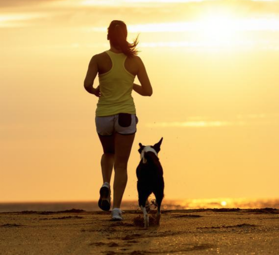 dog and woman running