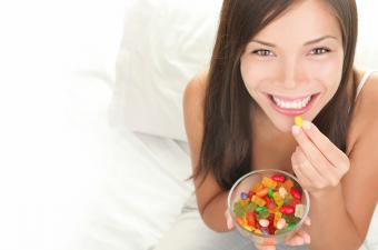 woman eating gums 